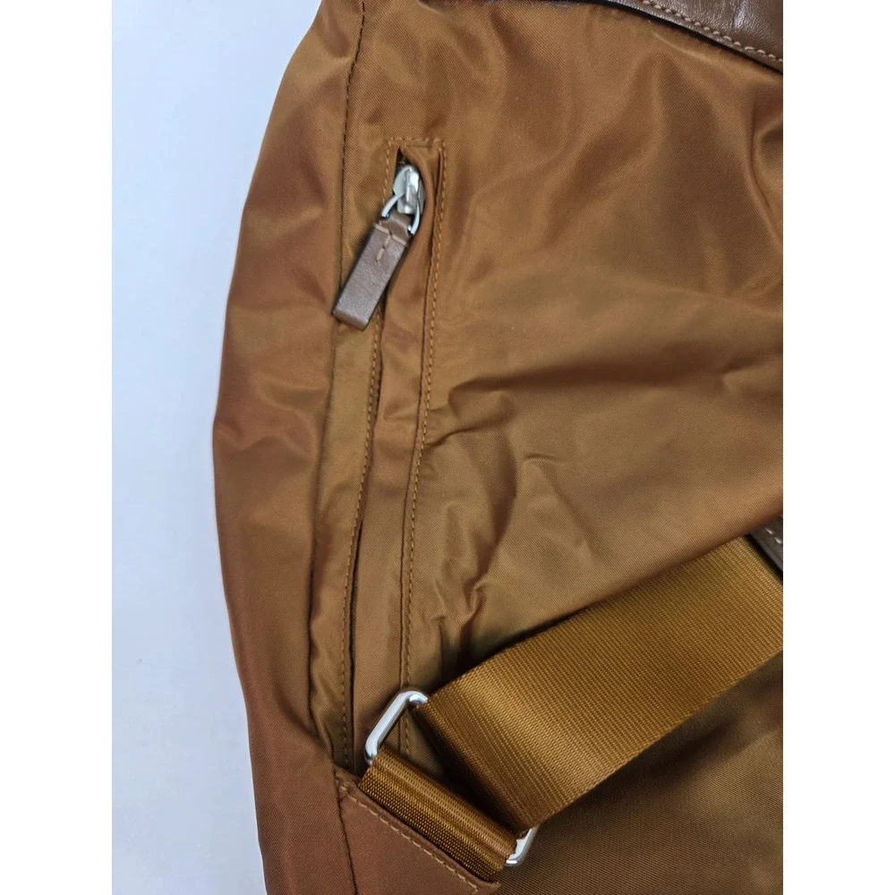 Tumi 48787 Voyageur Basel Backpack in a brown‎ nylon material